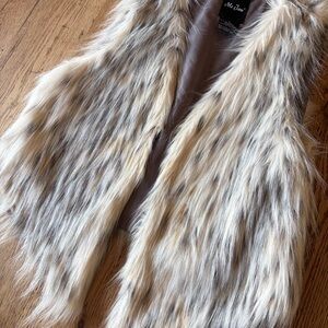 Beautiful & fun multicolor Faux Fur vest. Like new!
